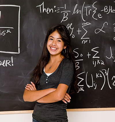 student at chalkboard