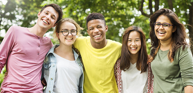 a diverse group of happy teenagers