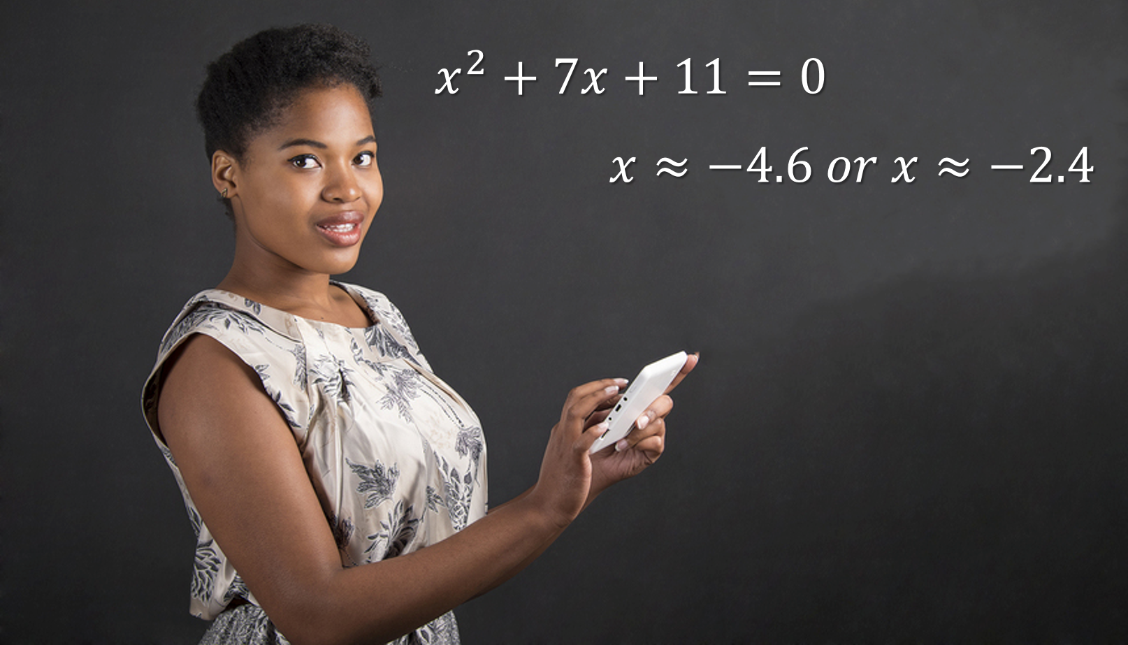 A girl at a blackboard checking the solution set to a quadratic equation with her mobile device