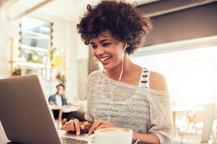 female student using laptop