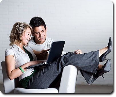 students looking at a laptop