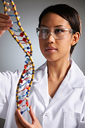 Young scientist with DNA model