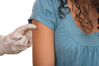 girl getting vaccine