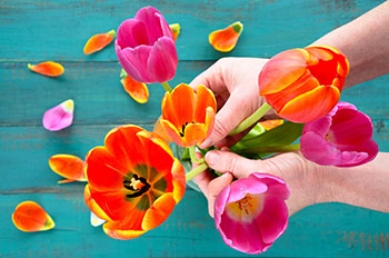 hand holding flowers