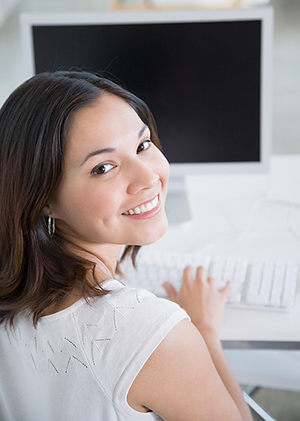 Girl sitting at computer