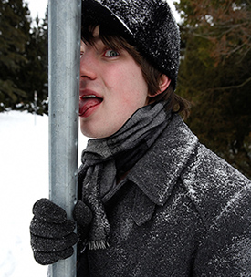 Student licking a cold pole