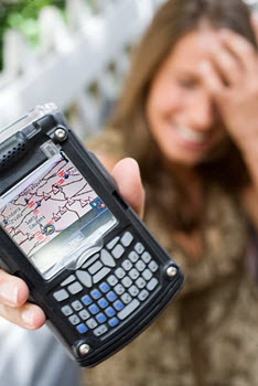 Girl holding a GPS unit