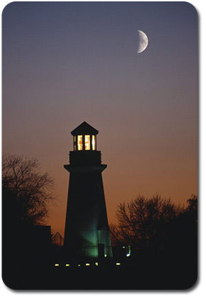 The Moon over a lighthouse