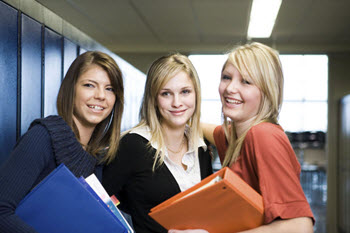 Three smiling students