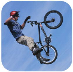 Image of man doing bike tricks