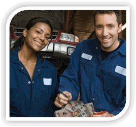 Woman and man worker holding machined tool.