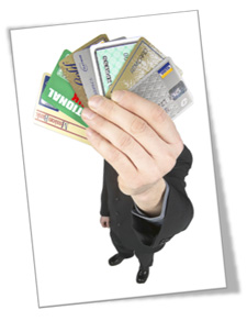 Image of hand holding credit cards