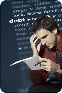 Montage of man looking concerned superimposed over the definition of the word debt.