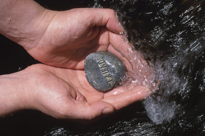 A rock with friends written on it