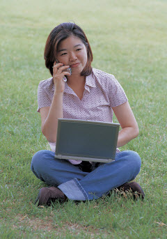 Girl on Phone and Computer