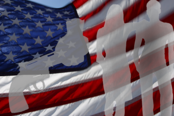 An American flag with two people and a gun overtop