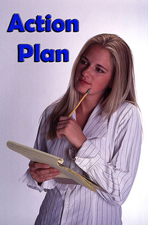 female student with notepad thinking