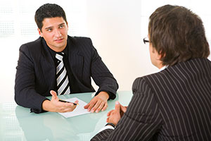 male student in an interview with employer