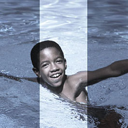 African American boy swimming