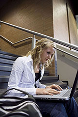 student working on computer