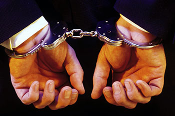 hands in handcuffs