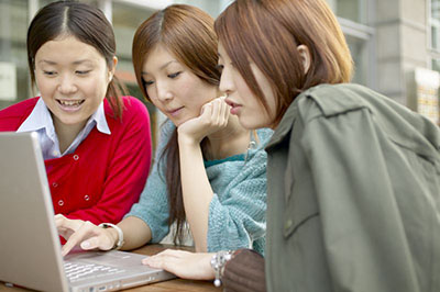 female students using a computer