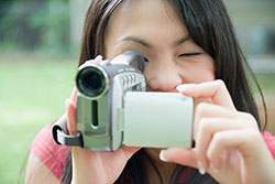 girl using videocamera