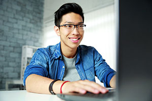 student working on laptop