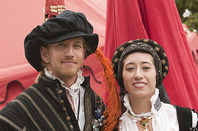 Two modern-day people dressed in Renaissance clothing