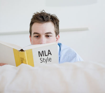 guy with MLA Style book