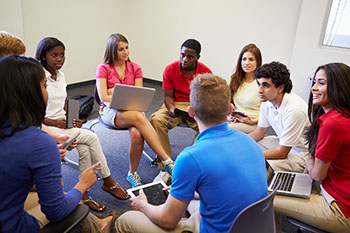 Students talking in a circle