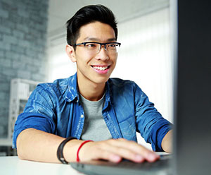 student working on computer