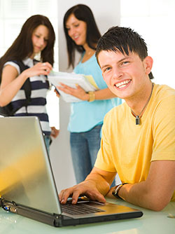 student working on a laptop