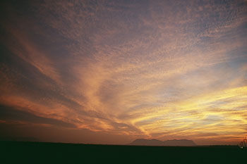 a picture of the rising Sun with various colors