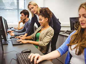 student working on computers