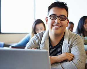 Smiling Student on computer