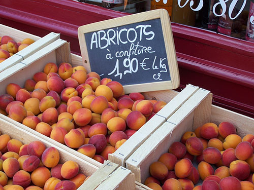 apricots for sale in an open-air market