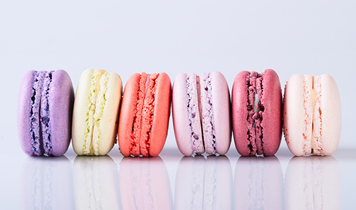 six colorful macarrons