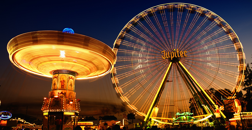 Time lapse image of a ferris wheel at a carnival