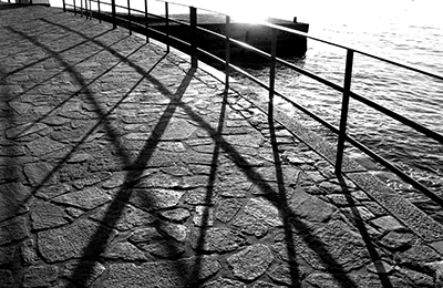 Lines and angles created by the shadow of a railing