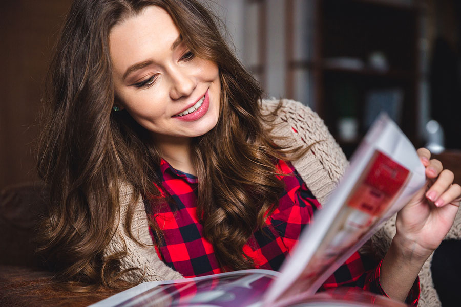 student looking through a magazine