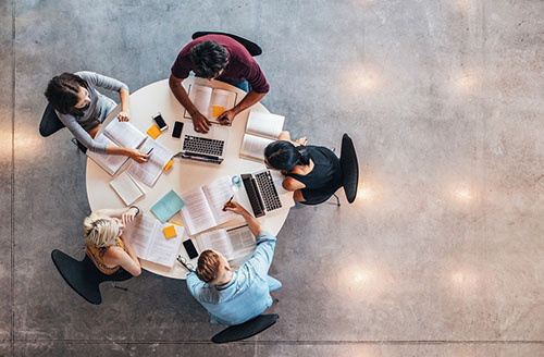 students sitting around a table studying