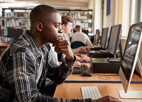 student working on a computer