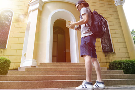 a student holding a book