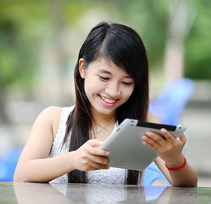 student using a tablet device