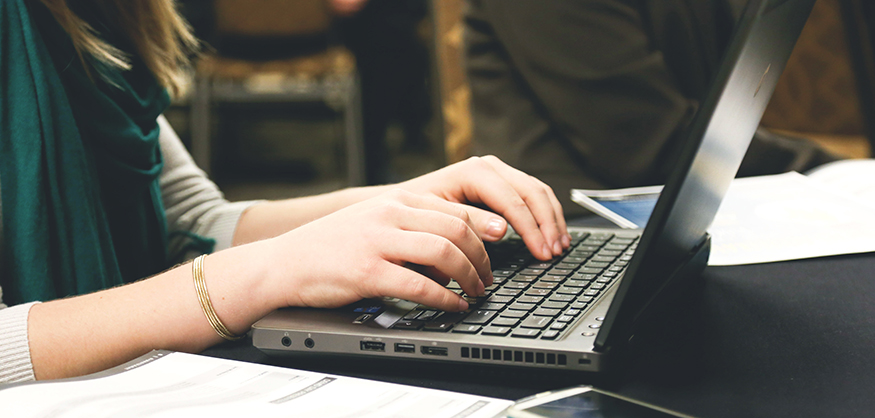 young girl at laptop