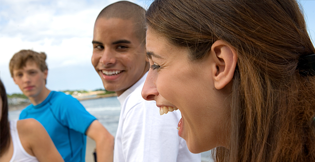 Teens laughing and smiling