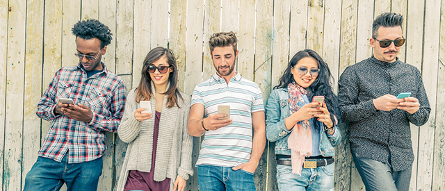 Group of people on smartphones