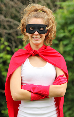 Young woman dressed as a superhero