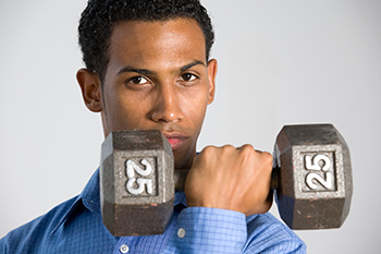 boy lifting weights